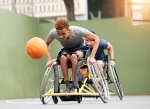 Sports, basketball game and men in wheelchair in action for training