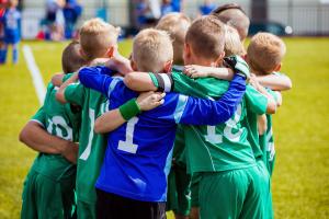 Youth athlete soccer huddle